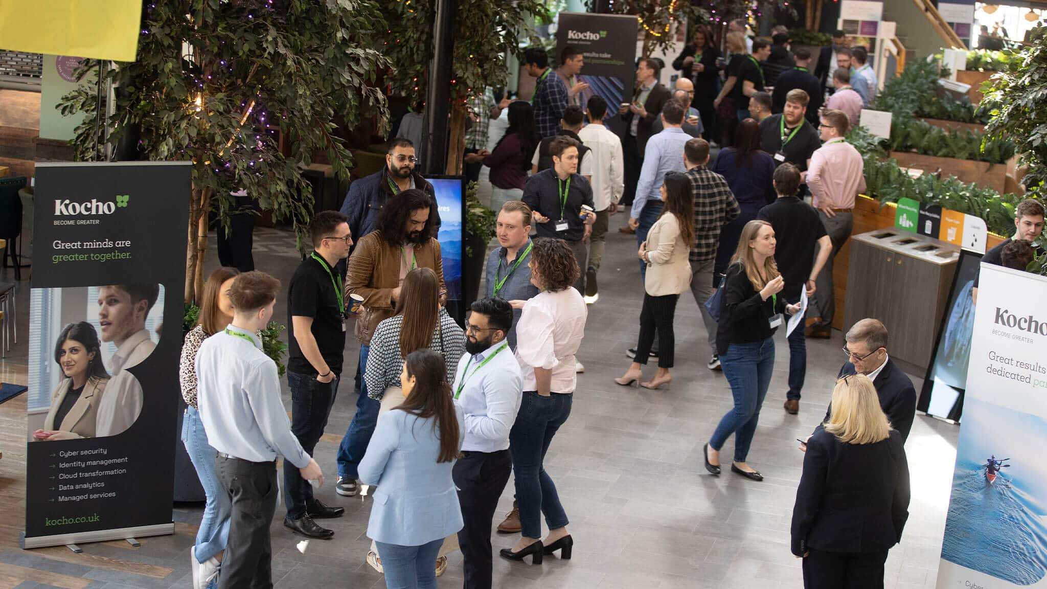 Wide angle shot of large gathering of people in a lobby