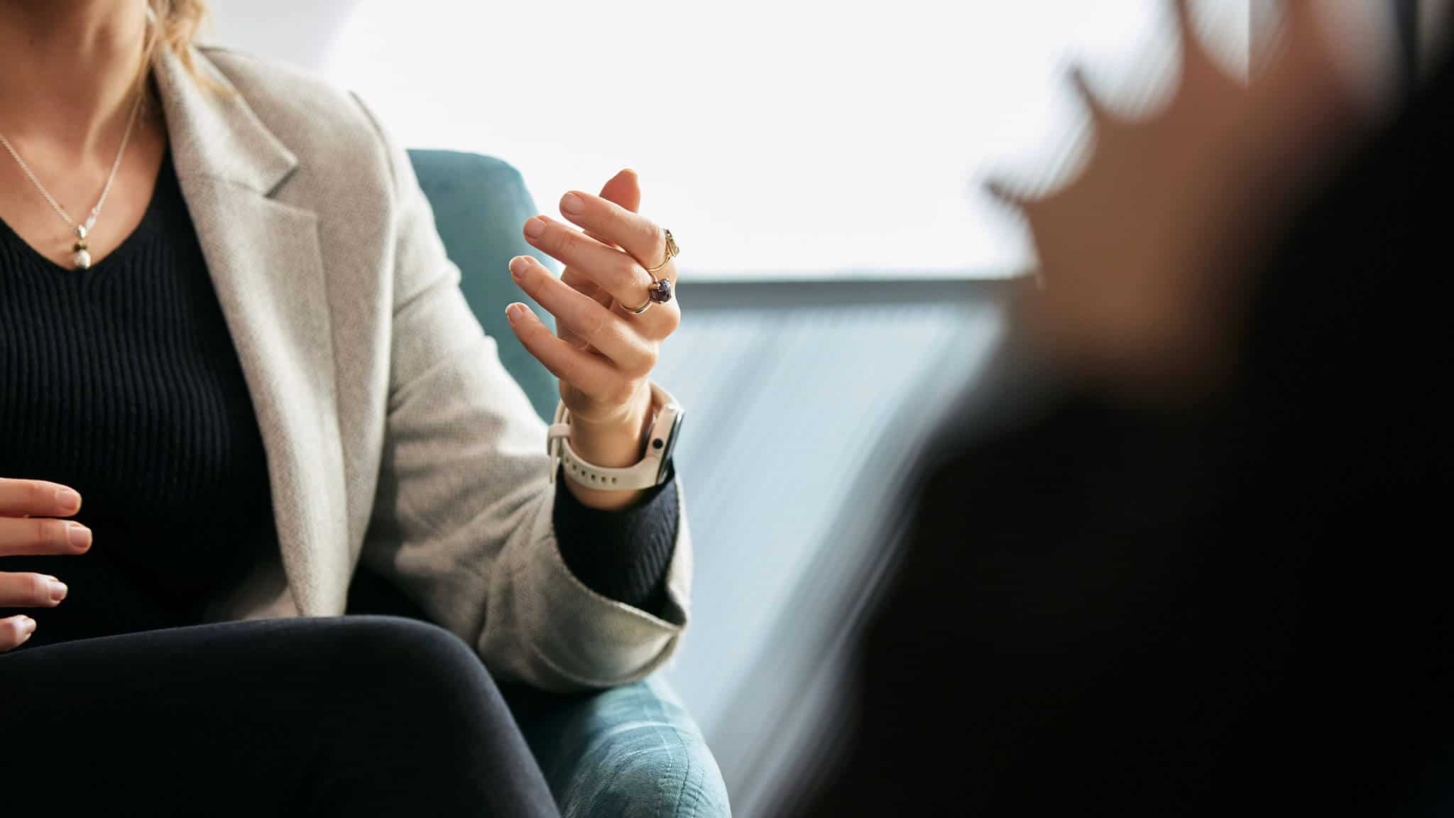 Close up shot of woman&#039;s left hand gesturing