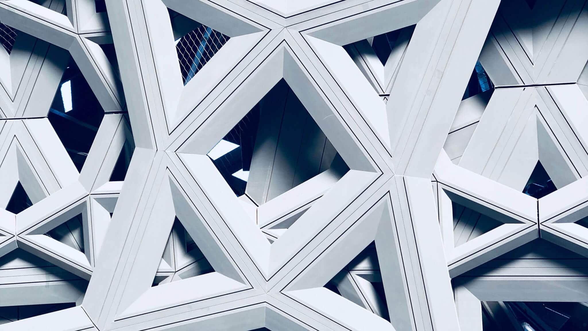 White geometric construction pylons